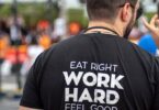 person wearing eat right work hard feel good printed shirt