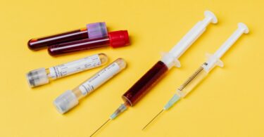 syringes and test tubes with blood samples