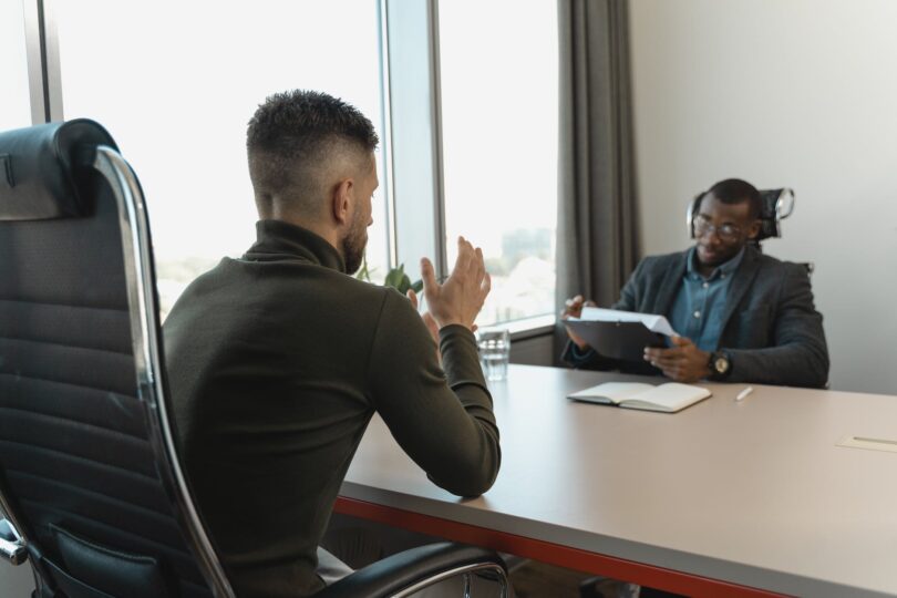 businessman looking at employee