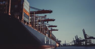 shallow focus photography of black ship