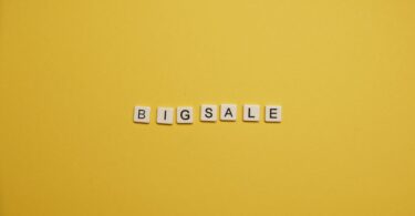 big sale text on yellow background