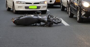 motorcycle lying on the road