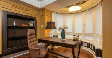 armchair and table in room